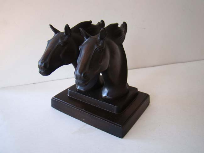A fine and rare pair of  'Double Horse Head' bookends made by Frankart circa 1930. — image 4